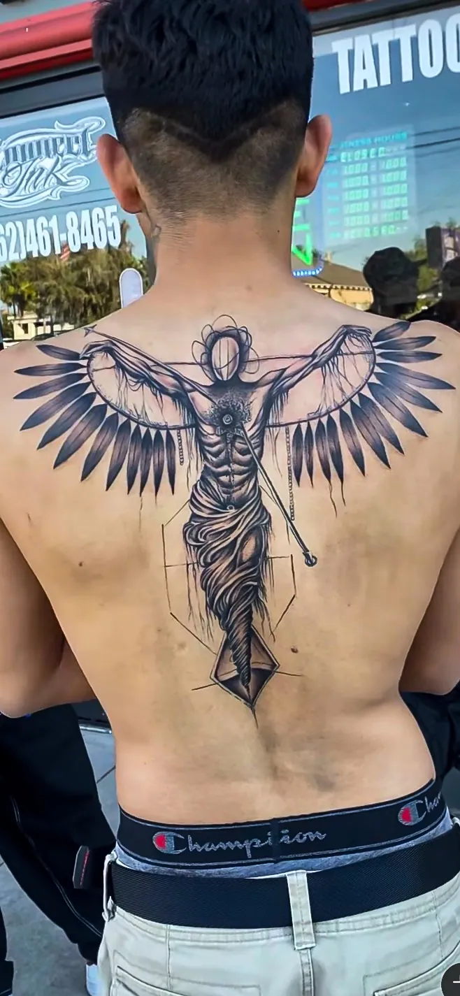 black and grey angel statue back piece tattoo by Steve Bachman, Long Beach