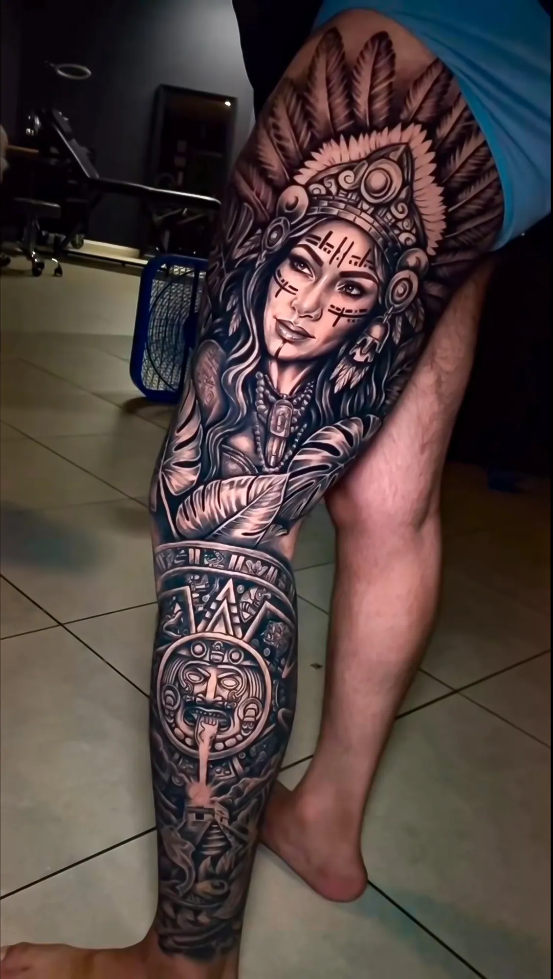 black and grey aztec warrior leg sleeve tattoo by Steve Bachman, Long Beach