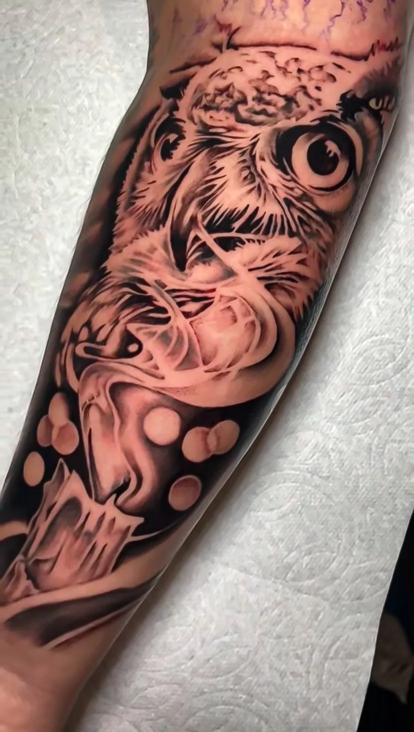 black and grey realism owl forearm tattoo by Steve Bachman, Long Beach