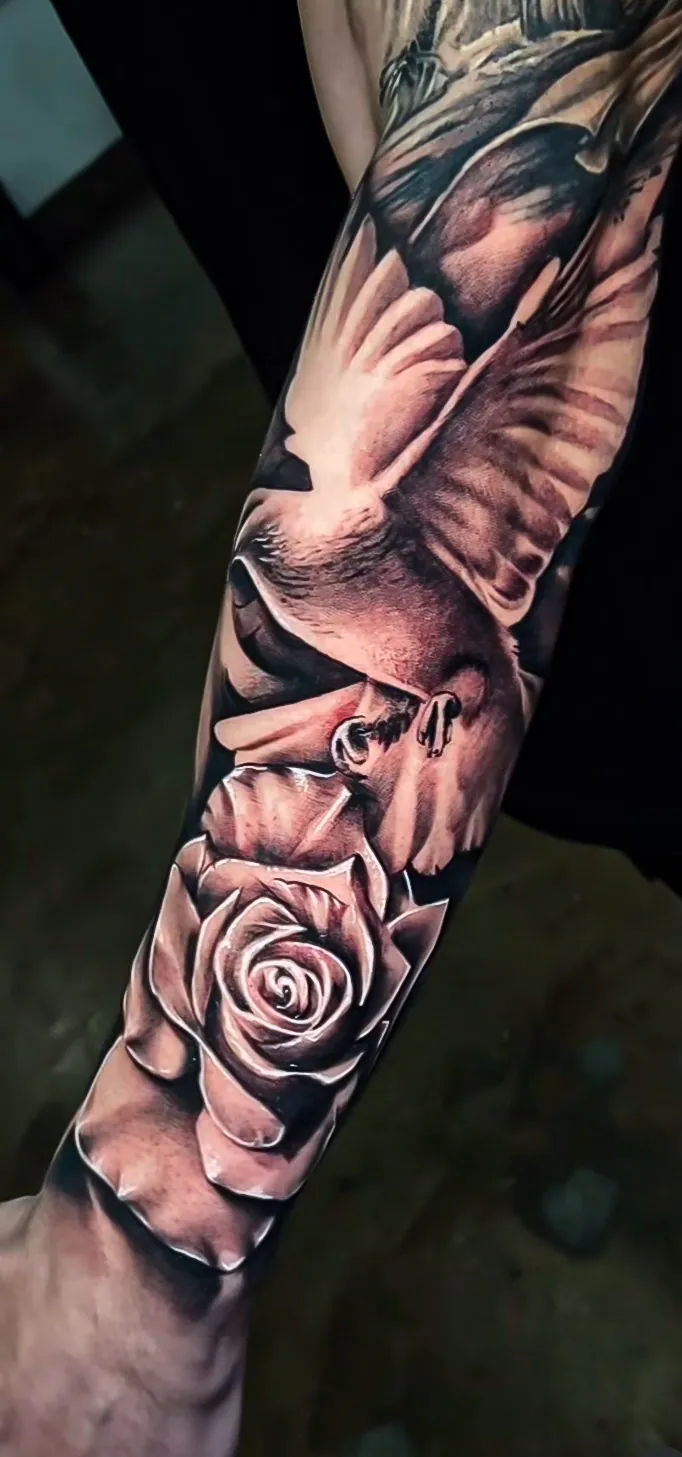 black and grey rose and dove sleeve tattoo by Steve Bachman, Long Beach