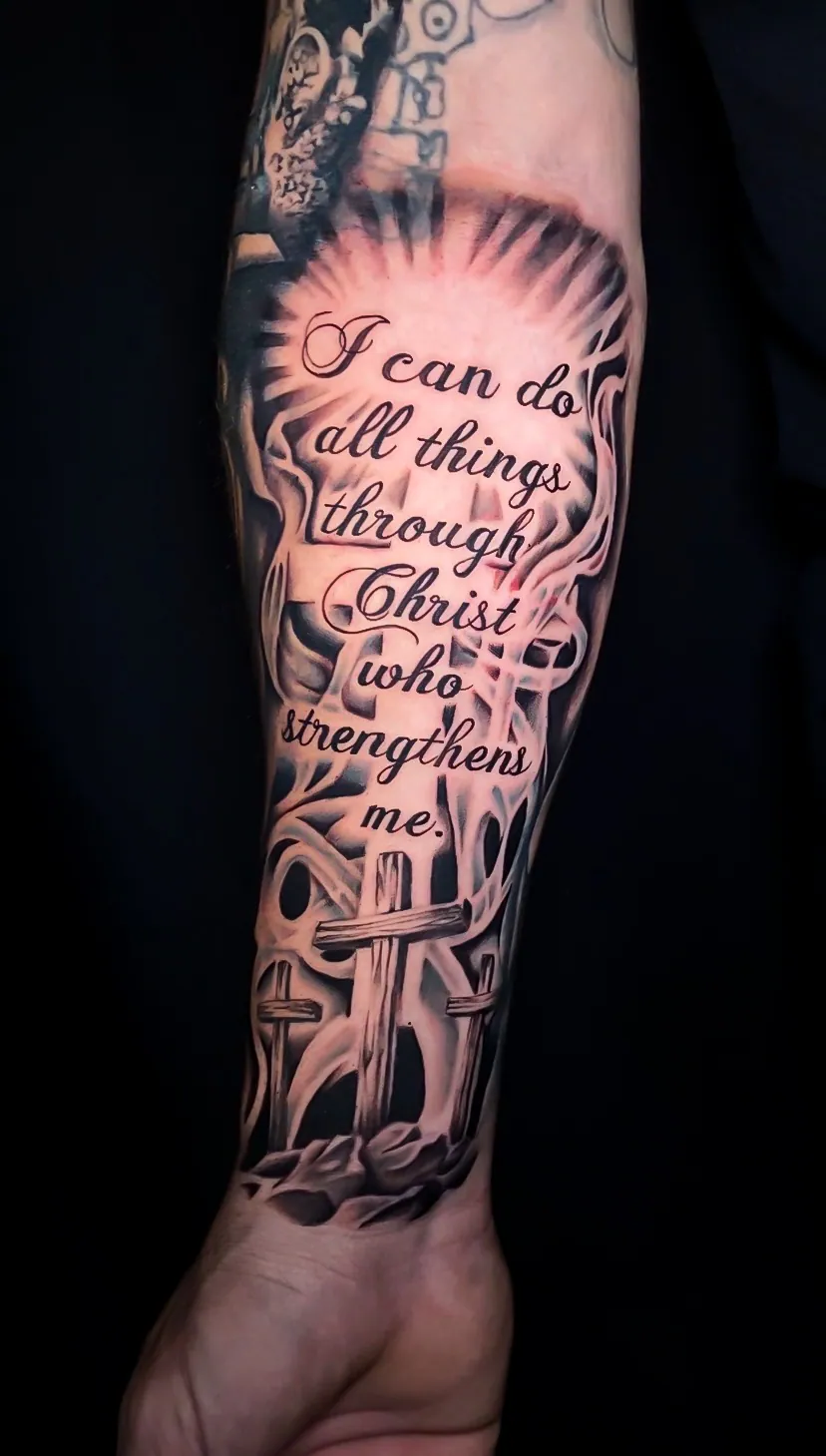 black and grey scripture lettering forearm tattoo by Steve Bachman, Long Beach