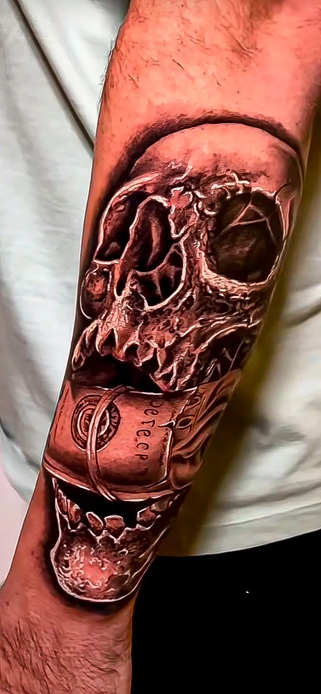 black and grey realism skull forearm tattoo by Steve Bachman, Long Beach