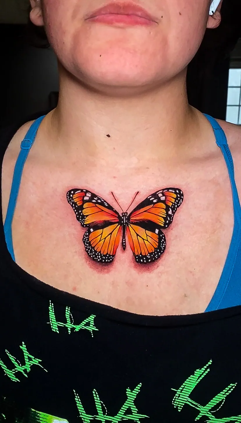 color realism monarch butterfly chest piece tattoo by Steve Bachman, Long Beach